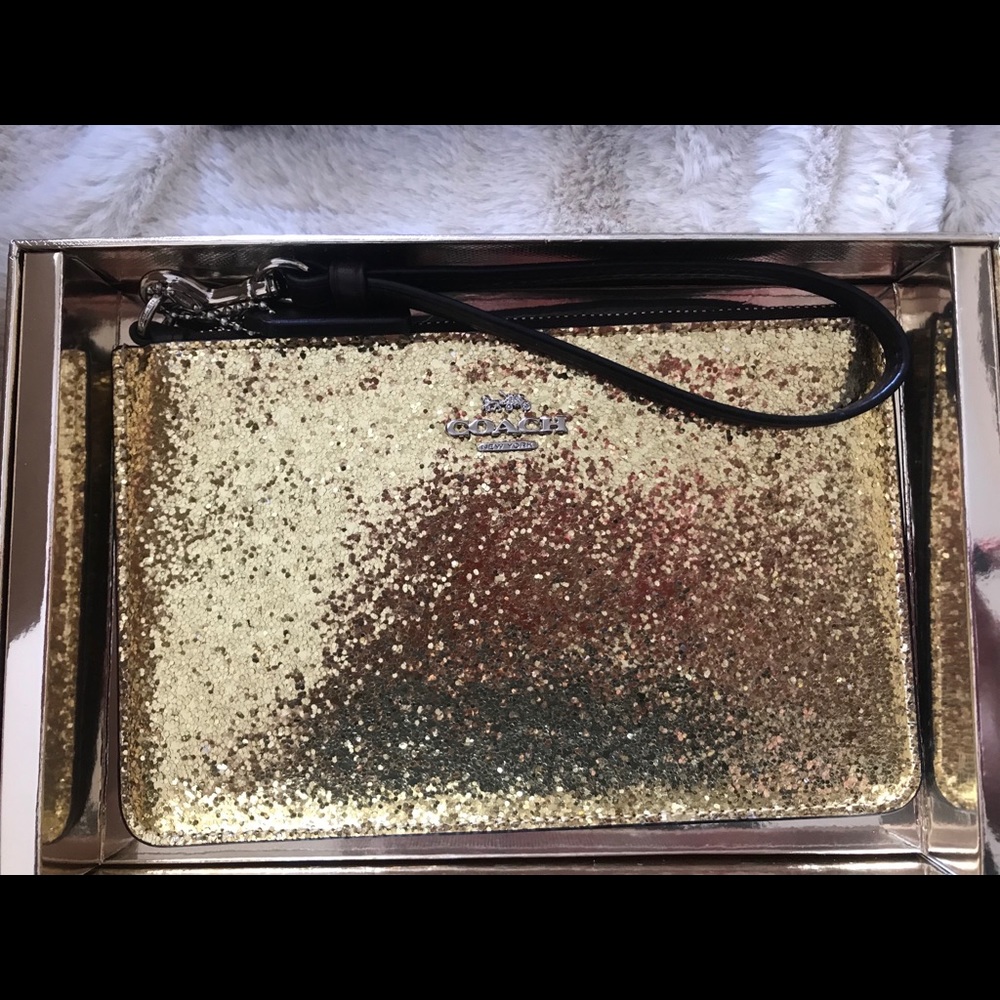 Coach wizard of oz gold wristlet